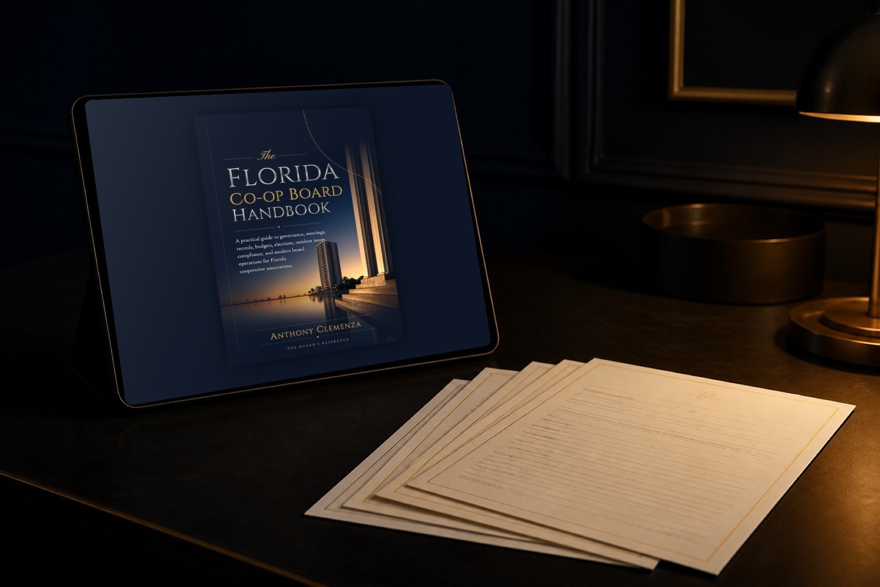 The Digital Edition on a tablet beside a fan of printed forms from the Forms Pack